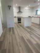 https://cdn.shopify.com/s/files/1/0041/3050/4833/files/greystone_waterproof_hybrid_flooring_online.jpg?v=1724717314