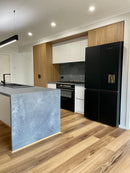 https://cdn.shopify.com/s/files/1/0041/3050/4833/files/native_blackbutt_hybrid_waterproof_flooring_kitchen_lifestyle_4.jpg?v=1724649405